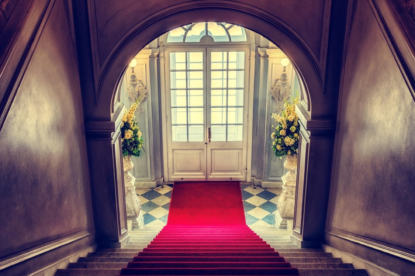 A low-pile rug runner laid along a hallway, the surface flat and tight with no visible tufting.